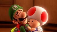 Luigi holding Toad in Luigi's Mansion 3