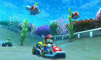 Mario and Yoshi driving under Cheep Cheeps in Cheep Cheep Lagoon.