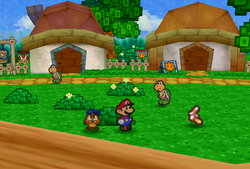 Mario finding Dried Shroom in the southest bush at the southwestern corner of the first scene. in Koopa Village of Paper Mario.