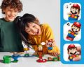 An image of two kids playing with LEGO Super Mario, with illustrations of some of the Mario figure's features