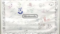 E3 2019 Nintendo Booth Developers Signature Wall.jpg