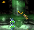 Low-G Labyrinth The fifth level, Low-G Labyrinth takes place inside a pipeline. It is filled a green mist that lowers the gravity, causing the Kongs to move slowly yet jump high. Quawks' assistance is required in the second part of the level.