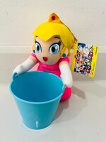 A plushie of Peach from Mario & Wario