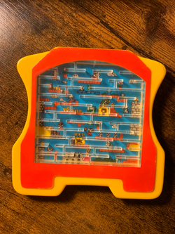 The Super Mario Bros. Super Maze outside of its packaging.