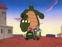 Koop-zilla chasing after Mario and Luigi's scooter in The Super Mario Bros. Super Show! episode "Mario Meets Koop-zilla"