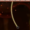 Squared screenshot of a hanging rope from New Super Mario Bros. 2.