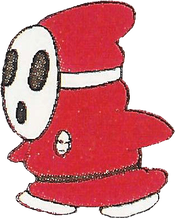 Artwork of "Shyguy - Red" from the Super Mario Bros. 2 manual (pg. 23)