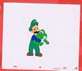 Unused animation cel of Luigi holding Baby Yoshi. (From the same scene as burnt Luigi.)