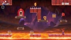 Screenshot of Fire Mountain level 3-2 from the Nintendo Switch version of Mario vs. Donkey Kong