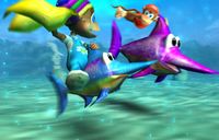 Donkey Kong Racing pre-release screenshot: Tiny Kong on Enguarde and Diddy Kong on a unnamed purple swordfish during underwater