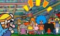The group talking about splitting the money up and ignoring Wario