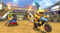 The Koopalings and Bowser racing through Wario Stadium in Mario Kart 8