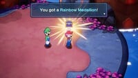 Mario and Luigi discover the Rainbow Medallion on Daintye Island in Mario & Luigi: Brothership