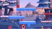 Screenshot of Slippery Summit level 6-1 from the Nintendo Switch version of Mario vs. Donkey Kong