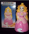 A Princess Peach cookie jar. It does the same thing as the Toad cookie jar when the lid is opened.