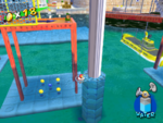 A Blue Coin in Ricco Harbor in the game Super Mario Sunshine.