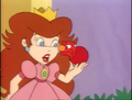 Oogtar gives Princess Toadstool an apple with a Caterpillar inside it