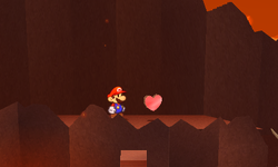Mario near a Heart in Rugged Road of Paper Mario: Sticker Star.