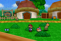 Mario finding Glasses in the bush with a white flower in the southwestern corner of the first scene in Koopa Village of Paper Mario.