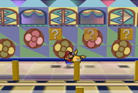 Image of Mario revealing a hidden ? Block in Shy Guy's Toy Box, in Paper Mario.