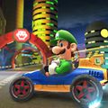 Luigi in the Mach 8 in Mario Kart Tour