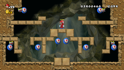 A screenshot of World 2's Enemy Course in New Super Mario Bros. Wii.