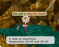 Mario collects a Whacka Bump.