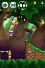 Screenshot of Scuttlebug Forest from Super Mario Run.