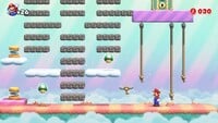 Screenshot of Fire Mountain's bonus level from the Nintendo Switch version of Mario vs. Donkey Kong