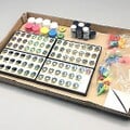 Included tiles and playing pieces