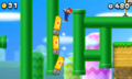 Mario being shot out of a Pipe Cannon through one-way gates.