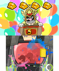 The player wiping away the blobs