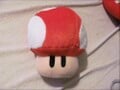 A plushie of a Mushroom from Super Mario RPG: Legend of the Seven Stars