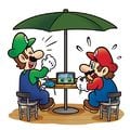 Mario and Luigi playing the game in tabletop mode