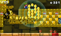 Mario in an underground level with many blocks and coins.