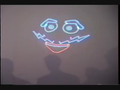 Wario's face in neon lights at E3 1996
