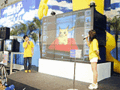 A photo of the Mario Artist series demonstration event in Nintendo Space World '99, which the game was demonstrated