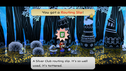 Mario getting the Routing Slip from Puni Elder in The Great Tree of Paper Mario: The Thousand-Year Door for Nintendo Switch.