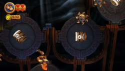 Donkey Kong and Diddy Kong collect the first Puzzle Piece of Blast & Bounce in Donkey Kong Country Returns