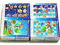 Four different 56-jigsaw puzzle designs based on Super Mario Galaxy 2. Each of them measures 257 x 182 mm and comes with a piece of candy.[3]