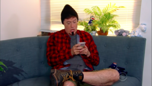 Stephen Colbert playing the Game Boy for a segment on The Late Show with Stephen Colbert