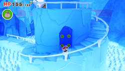 Mario standing near 4 Coins on Ice Vellumental Mountain of The Origami King.