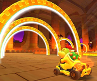 Thumbnail of the Bowser Jr. Cup challenge from the 2020 Yoshi Tour; a Ring Race challenge set on GBA Bowser's Castle 2