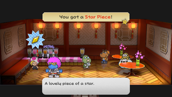 Mario getting the Star Piece in the juice shop of Glitzville in the remake of the Paper Mario: The Thousand-Year Door for the Nintendo Switch.