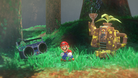 Mario next to a Steam Gardener and a boombox