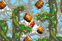 The Kongs blasting through a narrow path through the brambles in Bramble Blast from Donkey Kong Country 2 on Game Boy Advance