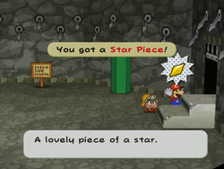 Mario getting the Star Piece behind the stairs to the Thousand-Year Door in the Pit of 100 trials room of Rogueport Sewer  in Paper Mario: The Thousand-Year Door.