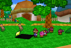 Mario finding a Star Piece under a hidden panel near the Bob-ombs in Koopa Village in Paper Mario