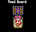 The Toad Award being rewarded