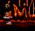 Squitter stands on one of his webs with the Kongs in the original version of the game.